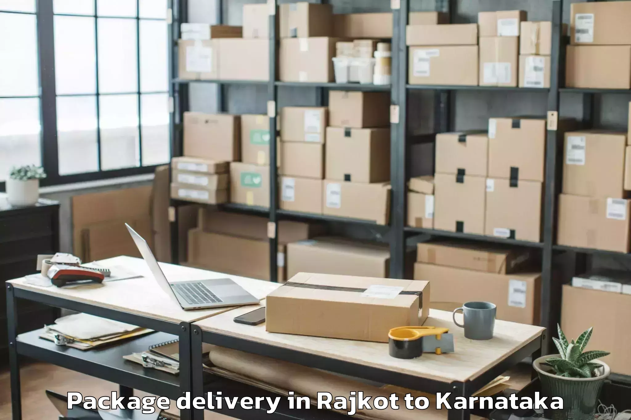 Book Rajkot to Suntikoppa Package Delivery Online